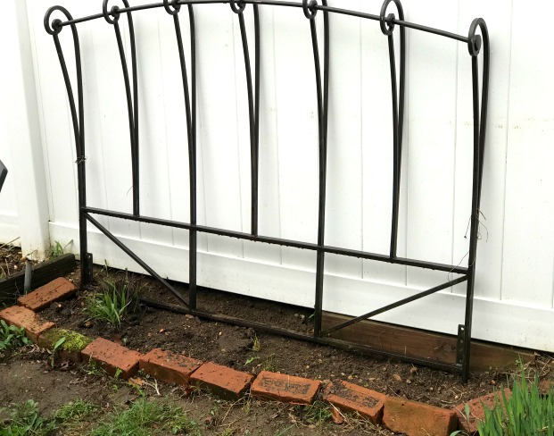 Repurposed bed frame trellis
