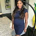 Serena Williams radiant as she flaunts her baby bump in a navy blue minidress
