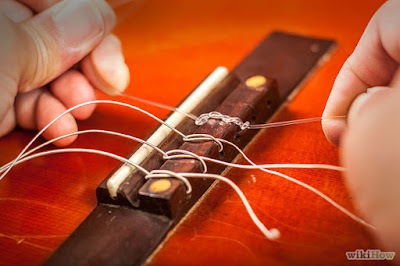 Cách thay dây đàn guitar Classical