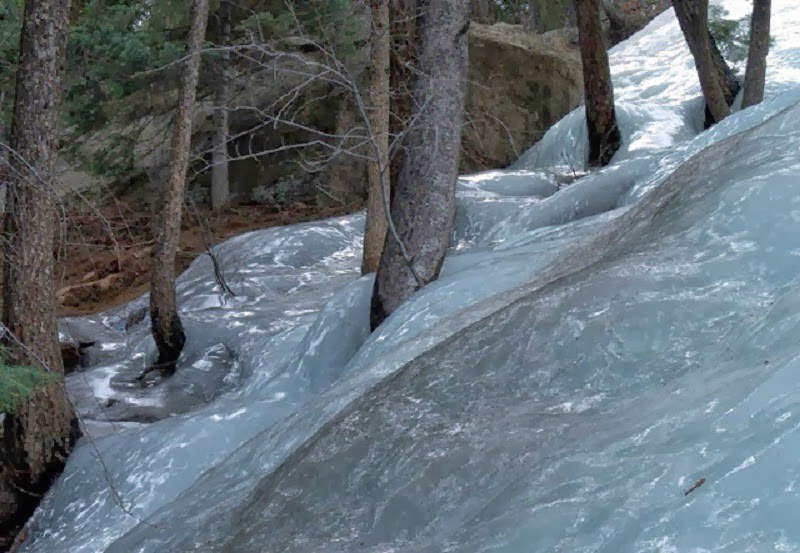 Snow Melts And Flash-Freezes Into Icy Downhill River