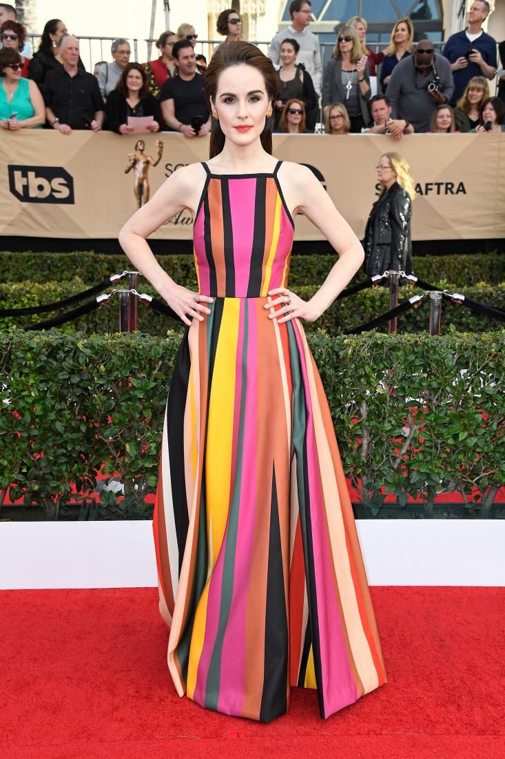 SPOTLIGHT: Who's behind Hollywood stars' stunning red carpet fashion?