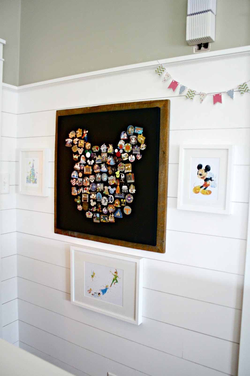 Our fun Disney art wall from Thrifty Decor Chick