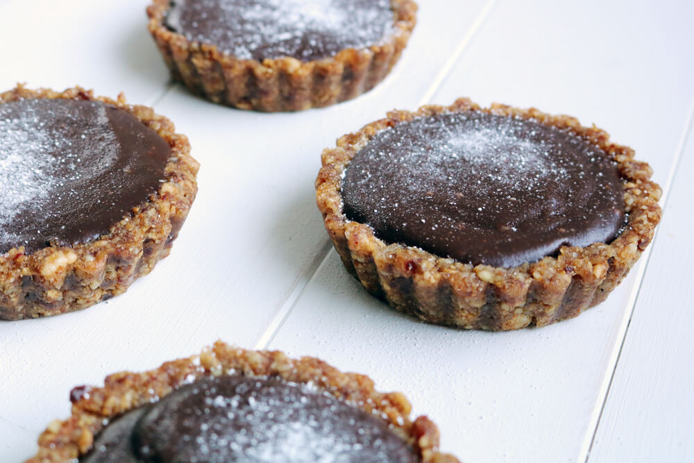 Mini Chocolate Tarts with Raw Date and Nut Crust | Hungry Little Bear