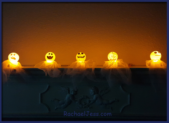 After we created the ghost lights I had some ghosts left over so I made larger holes in the bottoms and placed them over LED tea lights - these I love!