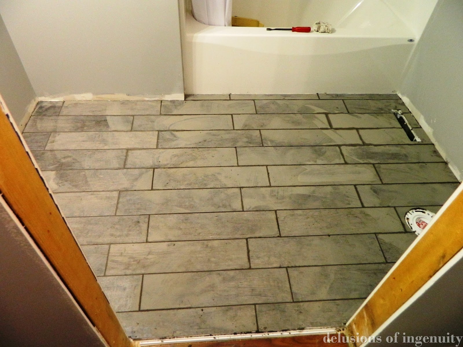 delusions of ingenuity: the tile of a bathroom floor