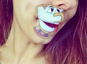 فتاة بريطانية تحول فمها لشخصيات كرتونية!