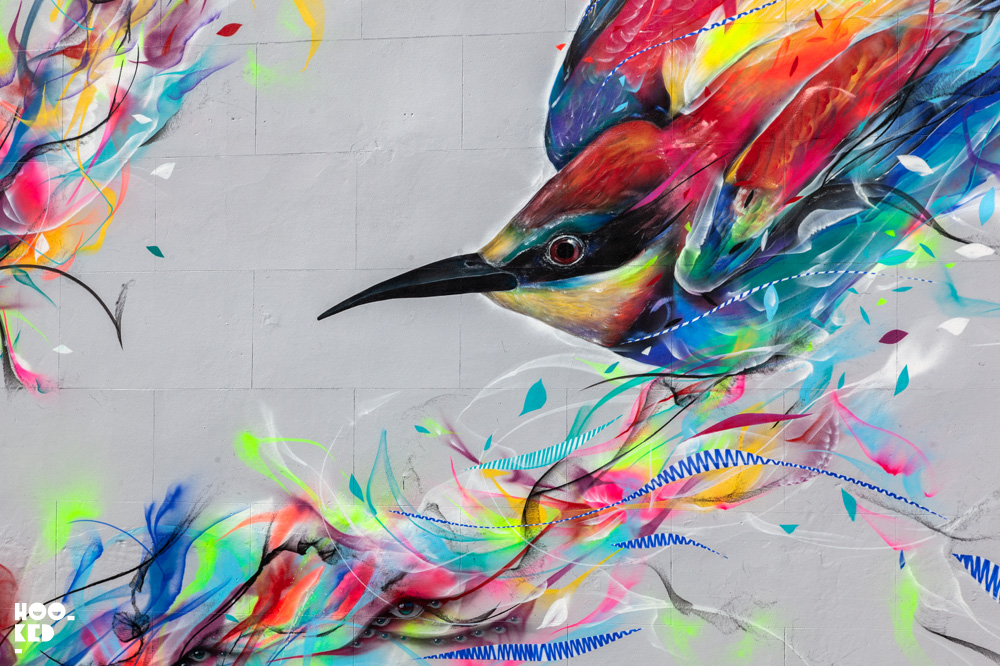 Brazilian street artists L7M paints bird mural in Cheltenham, UK Brazilian street artists L7M paints bird mural in Cheltenham, UK
