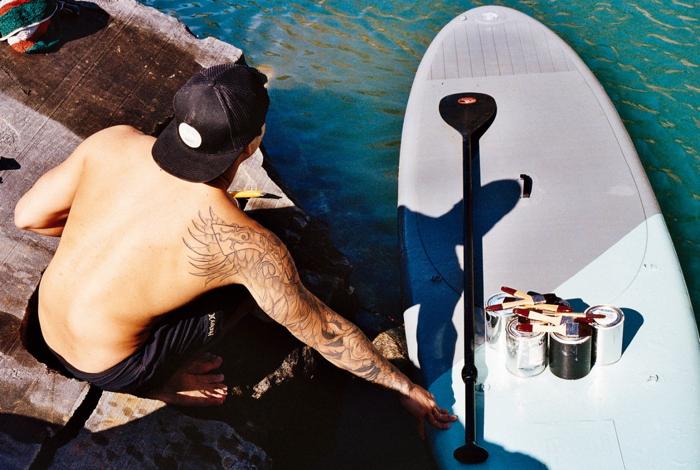 Artist Paints Murals of Women While Floating on a Surfboard Artist Paints Murals of Women While Floating on a Surfboard