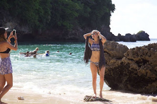Let her curves do the talking perfect in a sporty bikini, the stunning blonde, Ashley James has wasted no time to roving the beautiful seashore at Bali, Indonesia on Saturday, January 23, 2016.
