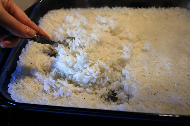 Make rice in the oven and avoid sticky or under cooked messes! This easiest ever garlic rice recipe is a family favorite.