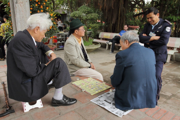 Vietnamese Chinese Checkers being played on the streets of Hanoi, Vietnam