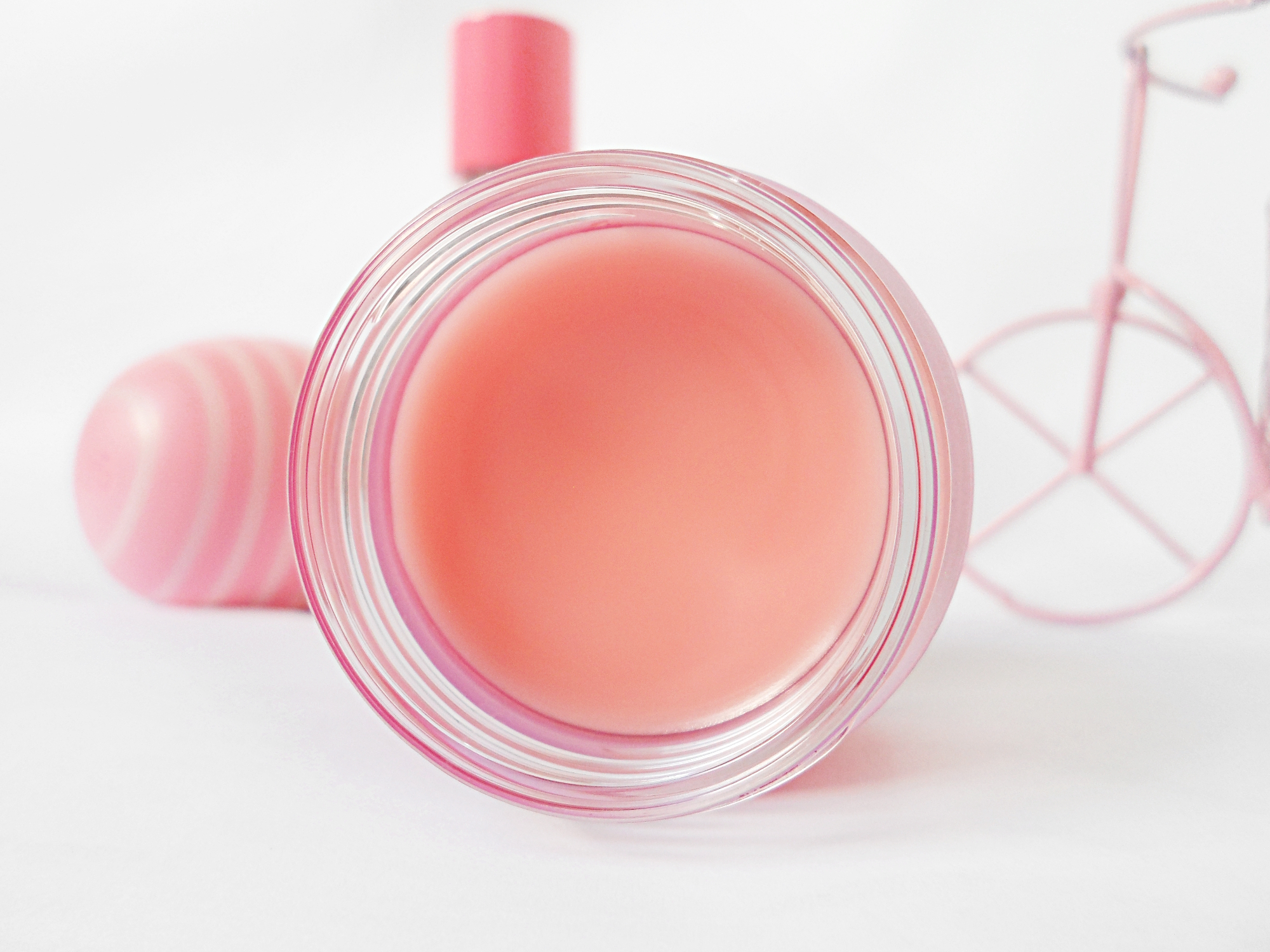 a close-up of a lip care mask by laneige brand laying on a white background in a studio
