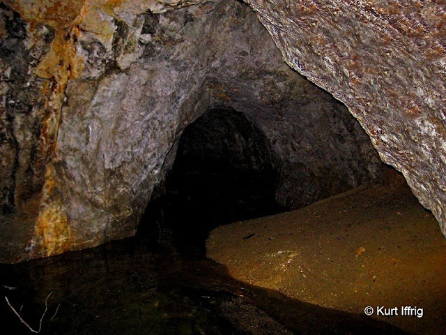 Just inside the Dawn Mine's lower entrance is a water filled sump, 55 feet deep.