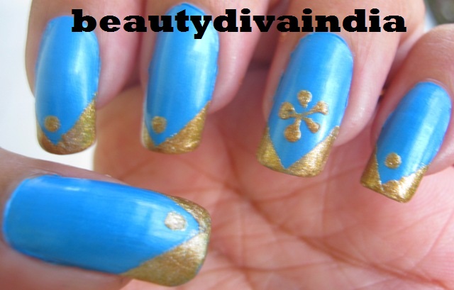 4. Sapphire Blue and Gold Nail Art - wide 6