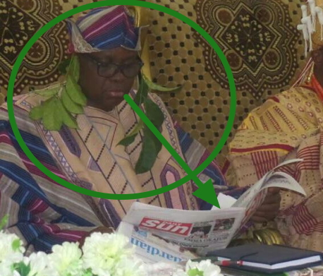 fayose reading newspaper installation 