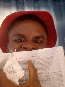 Photogist: Man Tears A Copy Of The Bible, Blames Catholic Priest
