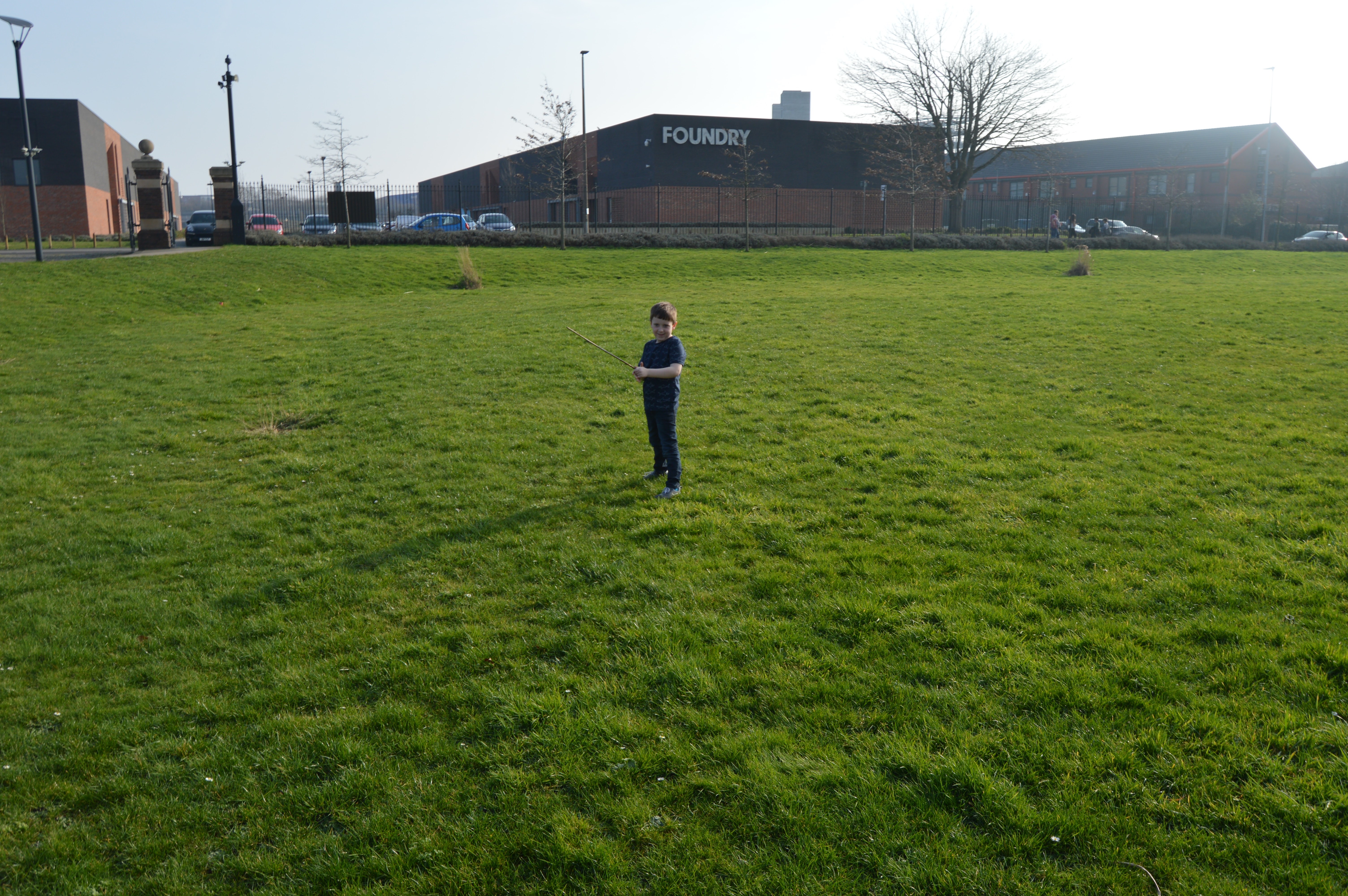 boy standing in The Grounds at Ordsall hall