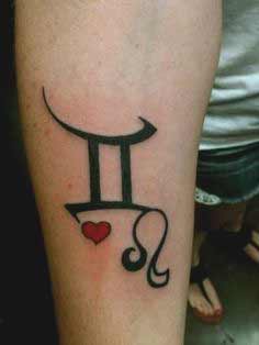 Best Gemini and Leo zodiac symbols with heart tattoo design on forearm