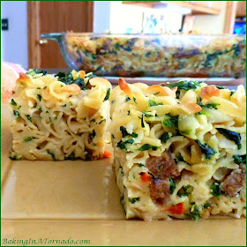 Spicy Sausage and Noodle Squares, wide noodles and hot sausages baked and sliced. Serve for lunch, dinner, or as a side dish | Recipe developed by www.BakingInATornado.com | #recipe #dinner #lunch