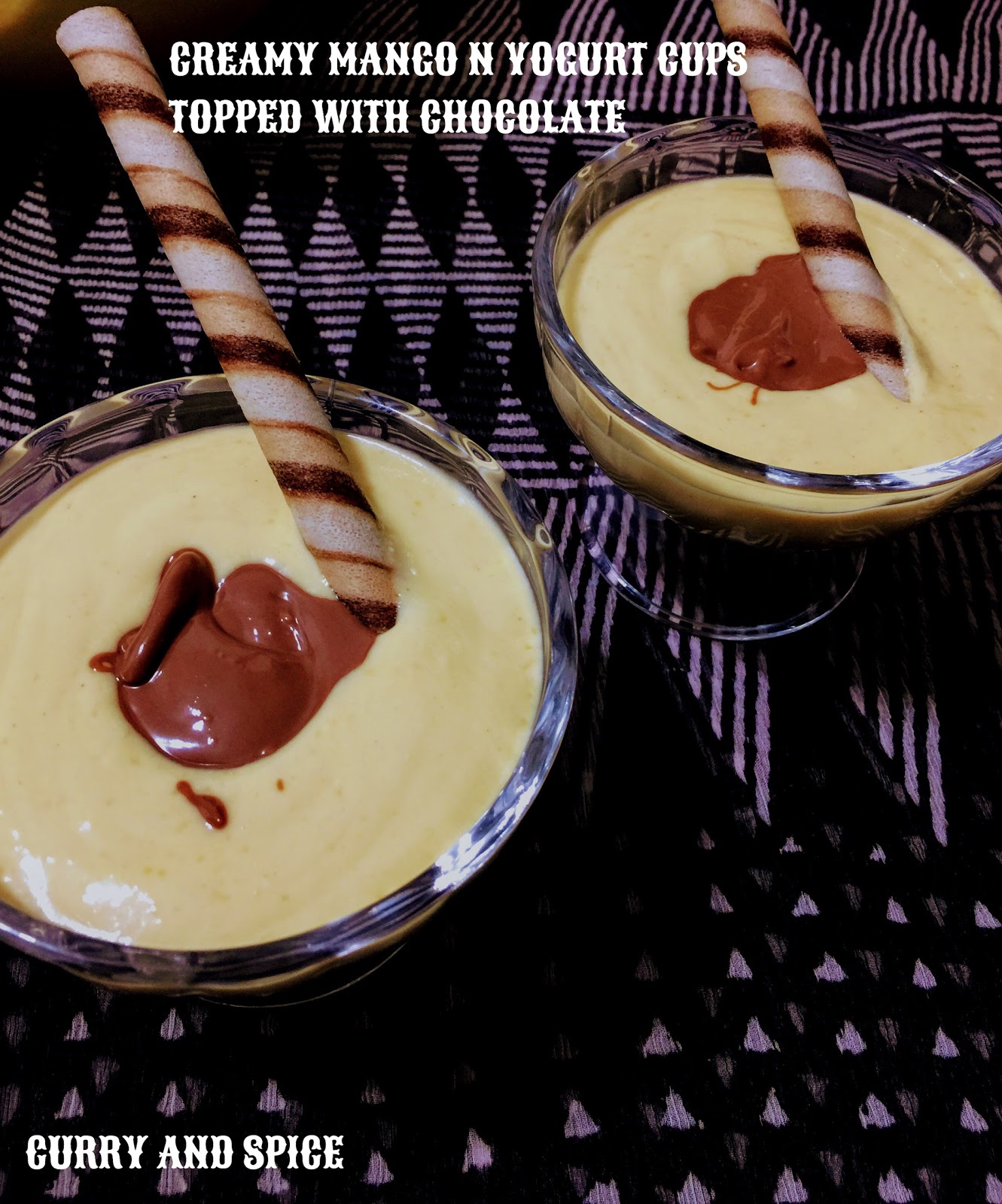 CURRY AND SPICE CREAMY MANGO AND YOGURT CUPS TOPPED WITH CHOCOLATE