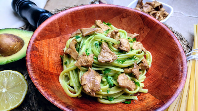 pasta with mushrooms avocado and parsley pesto detail
