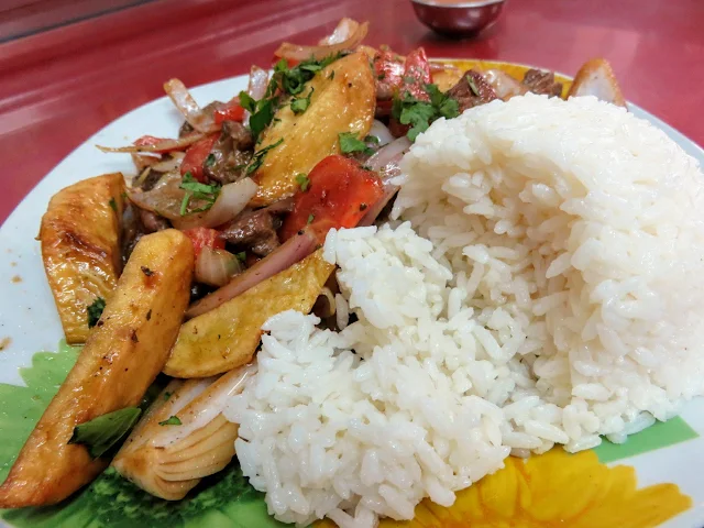 Lomo and rice served at a small restaurant in Lima Peru