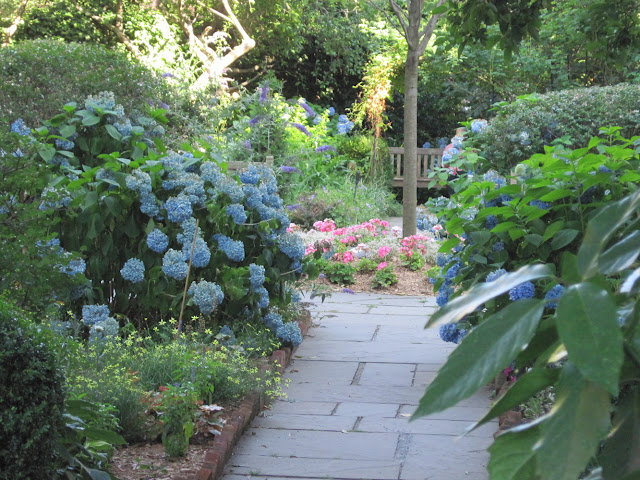 The Gardens at Saint Luke in the Fields are a must see for fans of Old New York, especially this flower path