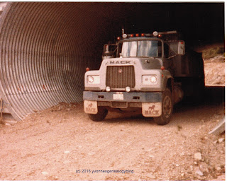 Mack dump truck on unfinished Coquihalla Highway