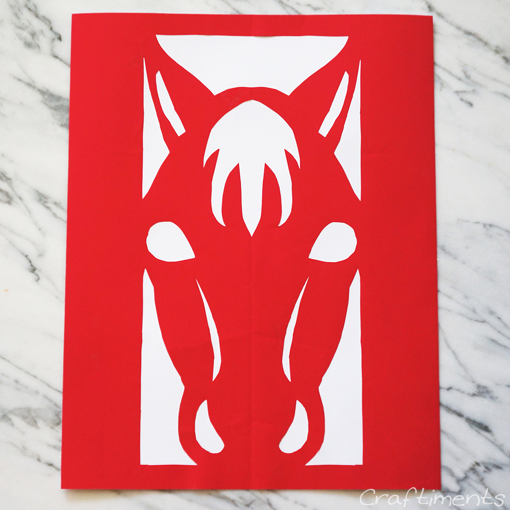 Year of the Horse paper cutting glued to cardstock