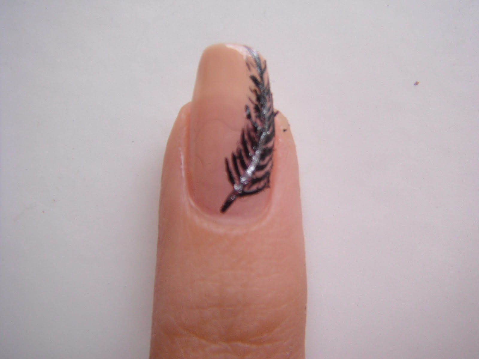 9. "Feather Nail Art for Long Nails" - wide 1