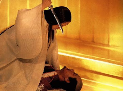 Lady Kaeda seduces (tries to stab) her brother in law, in Oscar winning Japanese war epic Ran, directed by Akira Kurosawa 