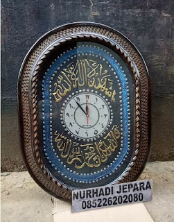 jam kaligrafi syahadat. ukuran 80 cm harga 850 rb