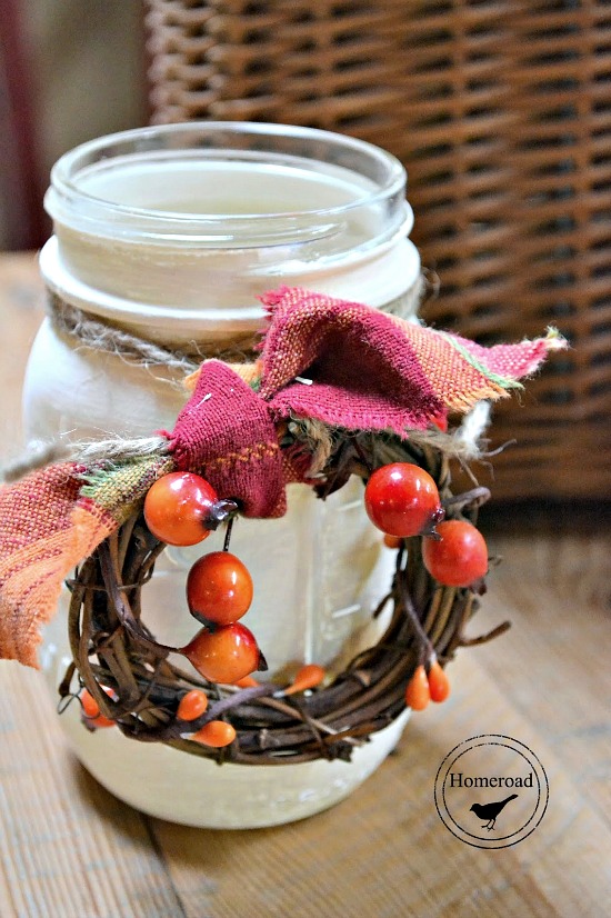 White painted mason jar with tiny fall wreath