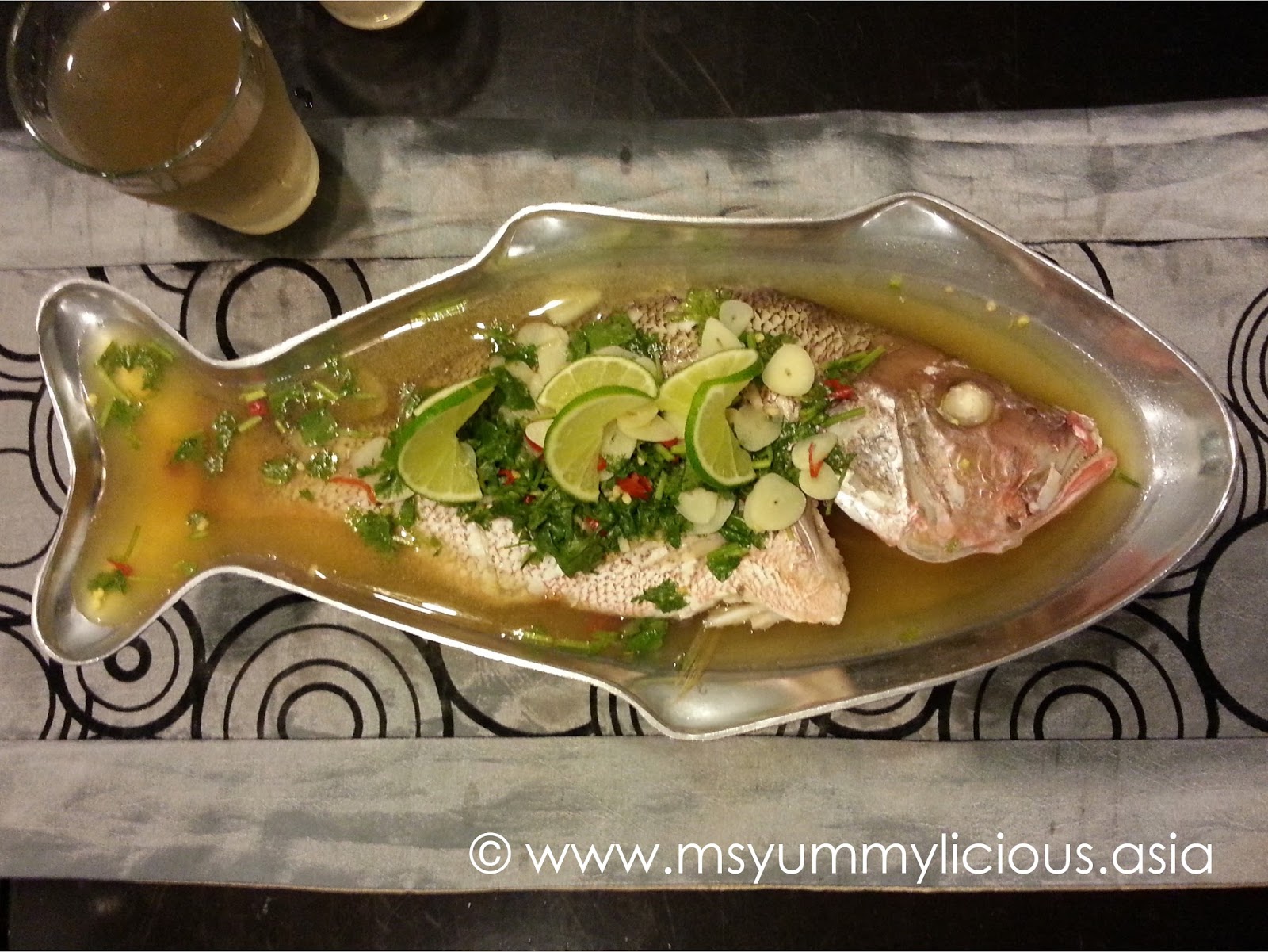 Steamed Fish with Thai Lime Dressing (Pla Neung Manao ปลากะพงนึ่งมะนาว