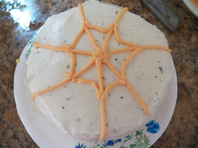 Frosting the Spider Cake