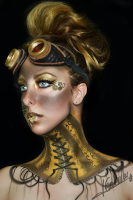 Steampunk makeup with gold body paint on neck and face, metal gears glued on and dirty goggle marks. fx mua