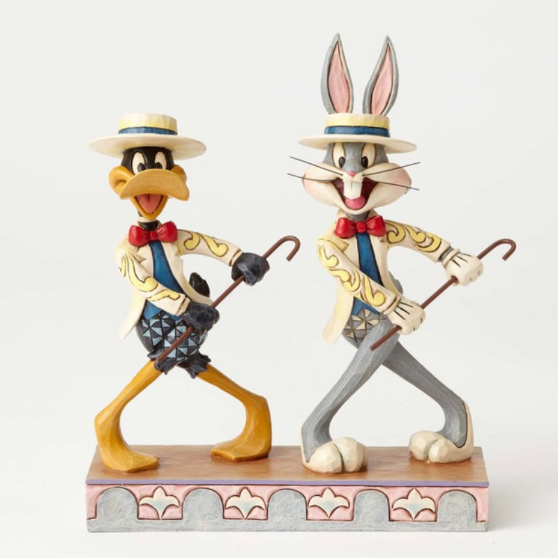 Acero y Magia: Figura El Pato Lucas y Bugs Bunny Looney Tunes