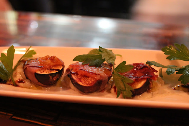 Prosciutto-wrapped figs at Aragosta Bar + Bistro, Boston, Mass.
