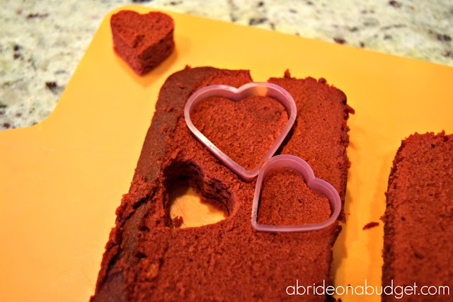 Looking for an engagement party or bridal shower dessert recipe? Try these Red Velvet Pound Cake Heart Desserts from www.abrideonabudget.com.