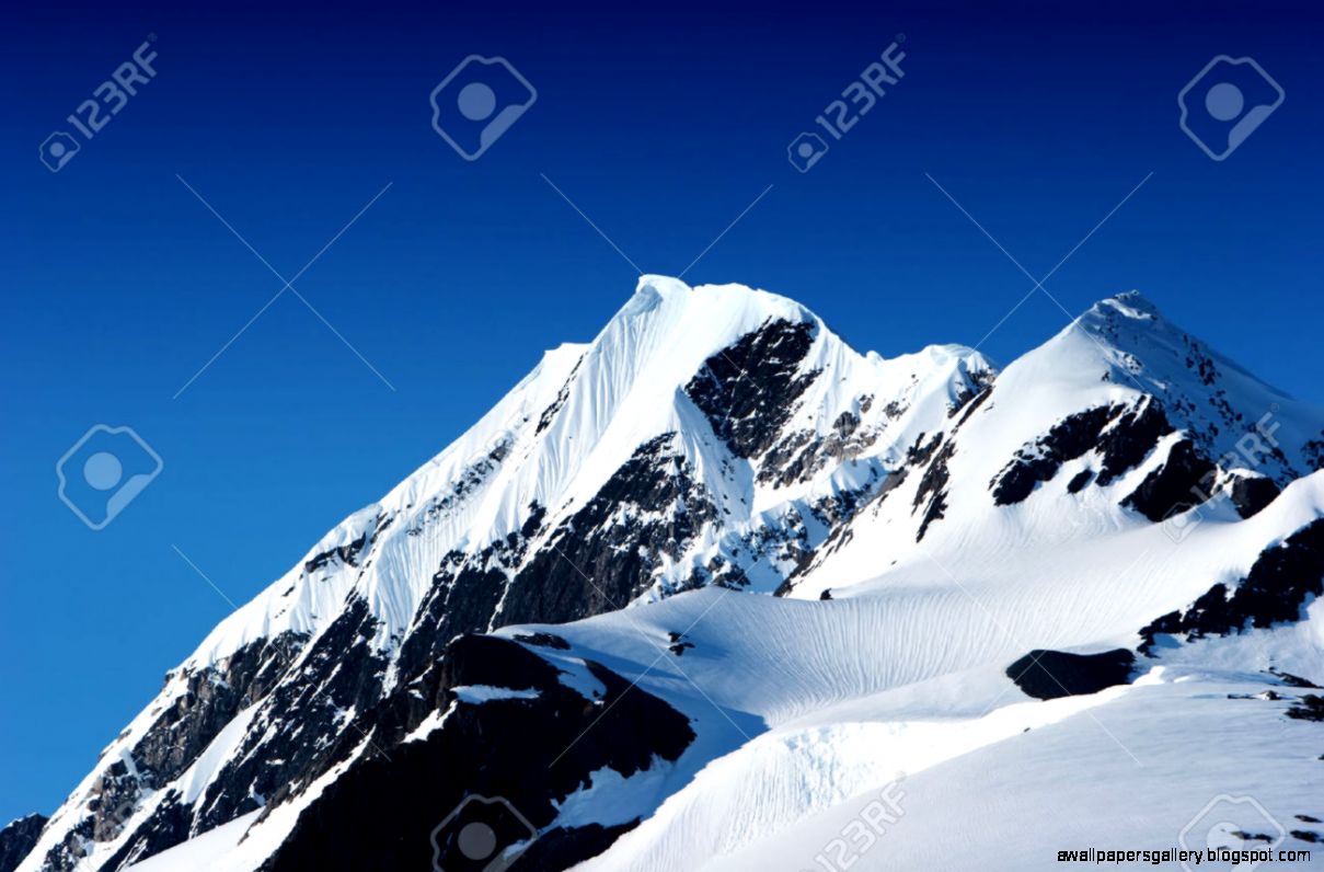 Snowy Mountain Peaks In Alaska Stock Photo Picture And Royalty