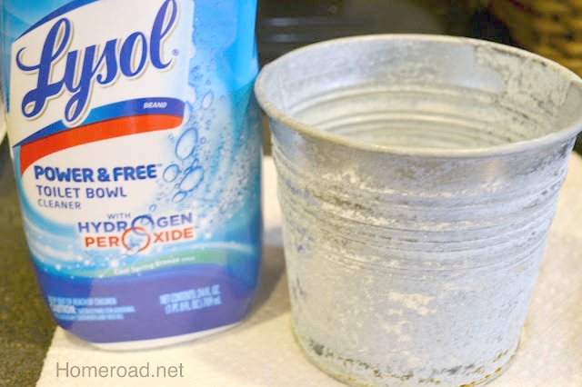 What can you use to change the look of shiny metal? Lysol cleaner and a metal pail
