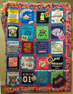 Quilt of high school t-shirts sashed with blue plaid and hot pink posts. Border is a confetti display of Texas Mink fringe.