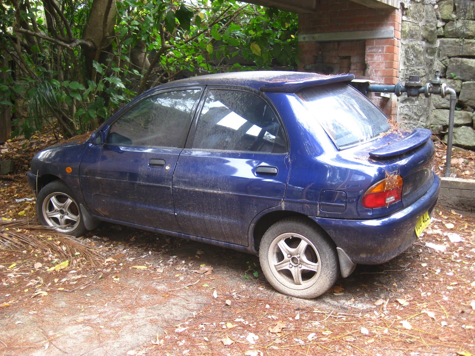Mazda autozam revue 1990