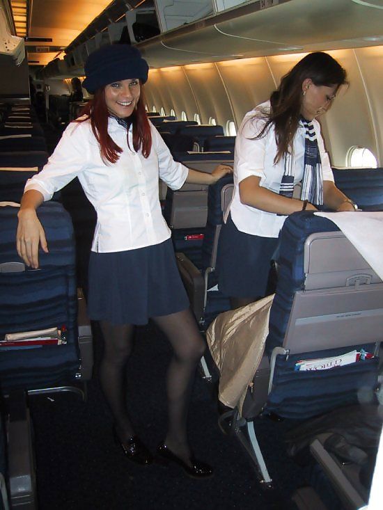 Female Flight Attendants Having Fun Girls And Car