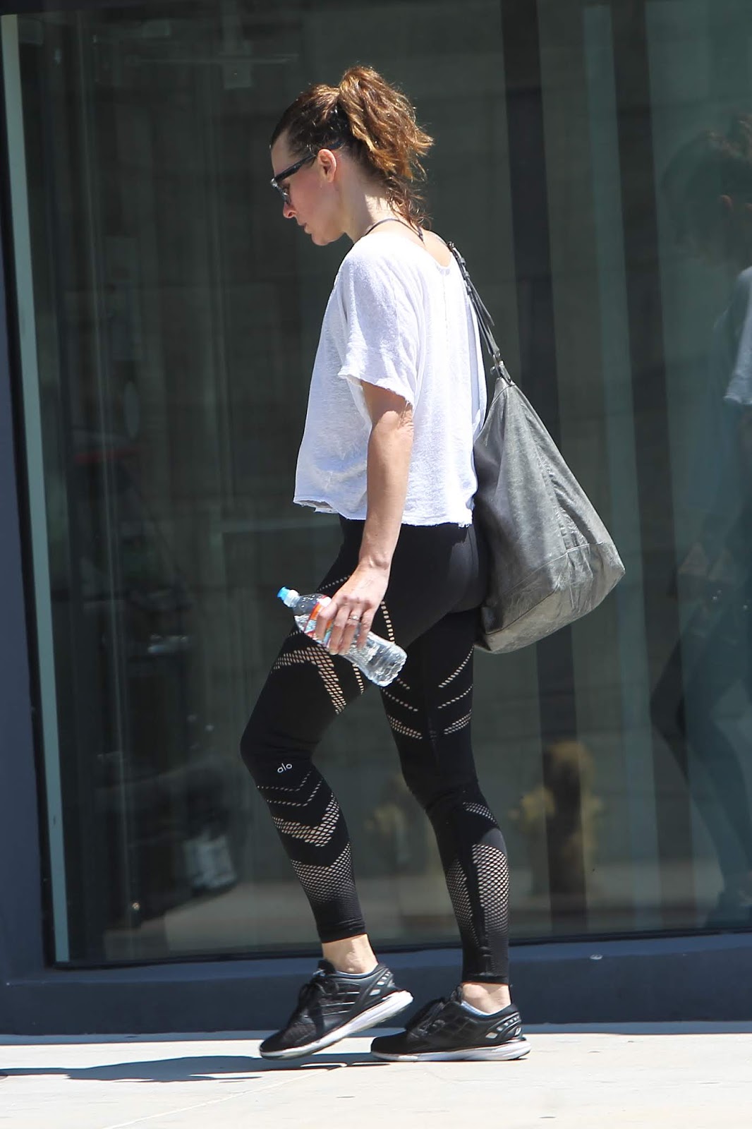 Milla Jovovich exits the gym after a morning workout in West Hollywood