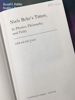 Niels Bohr's Times: In Physics, Philosophy, and Polity, by Abraham Pais, superimposed on Intermediate Physics for Medicine and Biology.