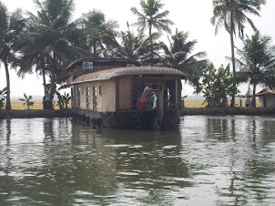 Kettuvallam(Boathouse) anchored at the countryside.