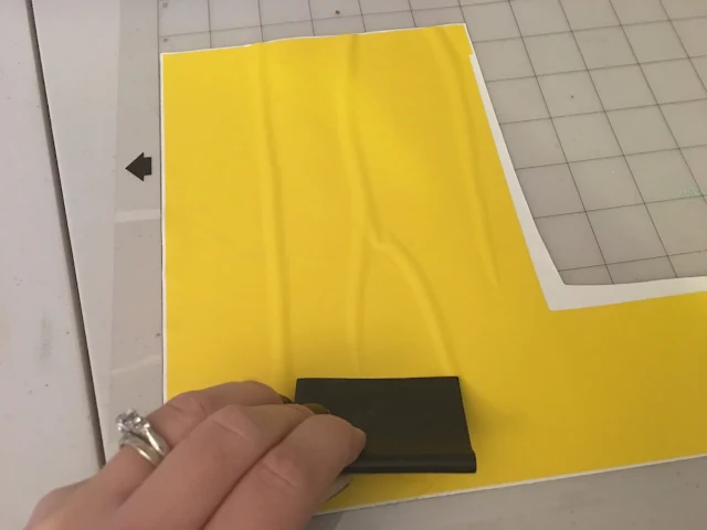 Silhouette scraper to remove bubbles from vinyl, silhouette scraper, vinyl bubbles, remove bubbles, silhoeutte vinyl tutorial, silhouette vinyl, vinyl is wrinkled