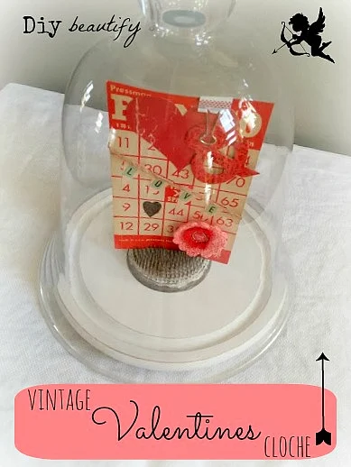 Display vintage Bingo card and other ephemera in a glass cloche for a sweet display! Find more at diy beautify!