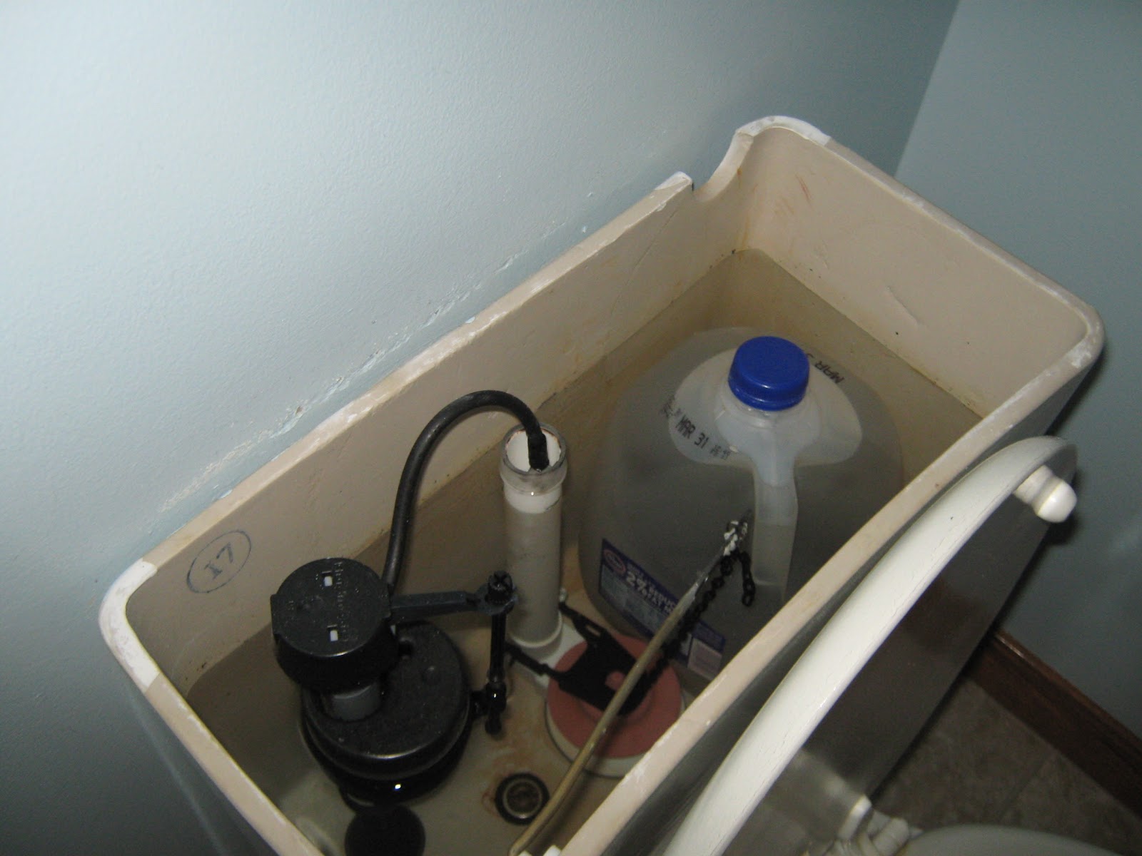 Simply Resourceful: Toilet Water Conservation With a Milk Jug